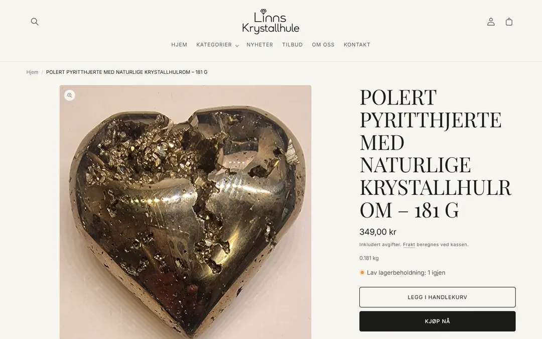 Produktsiden for et polert pyritthjerte med bilde, pris, vekt, lagerstatus og knappen Legg i handlekurv